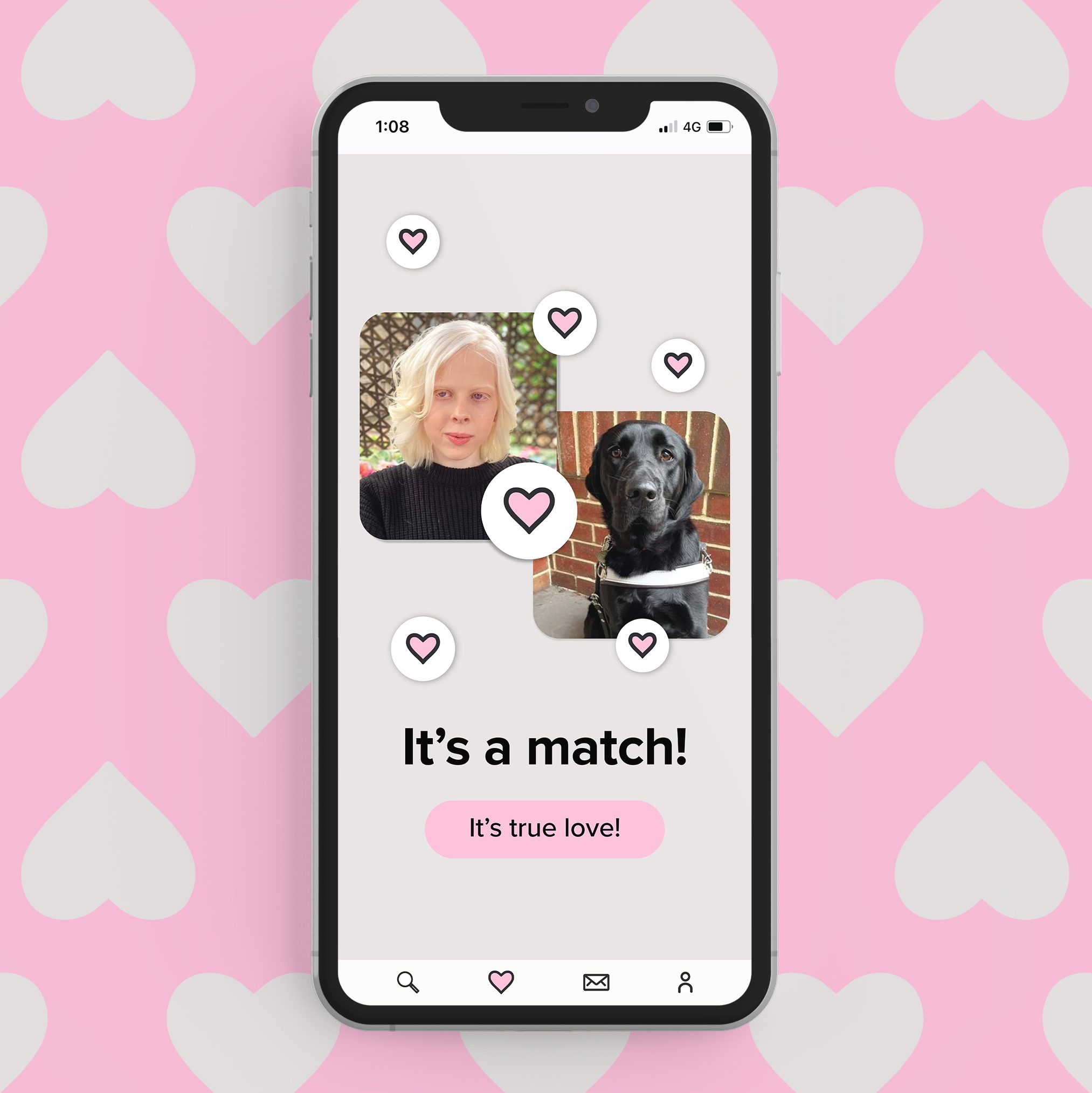 A phone showing the text "It's a match" with a picture of a person and their Guide Dog. Pink hearts surround them.