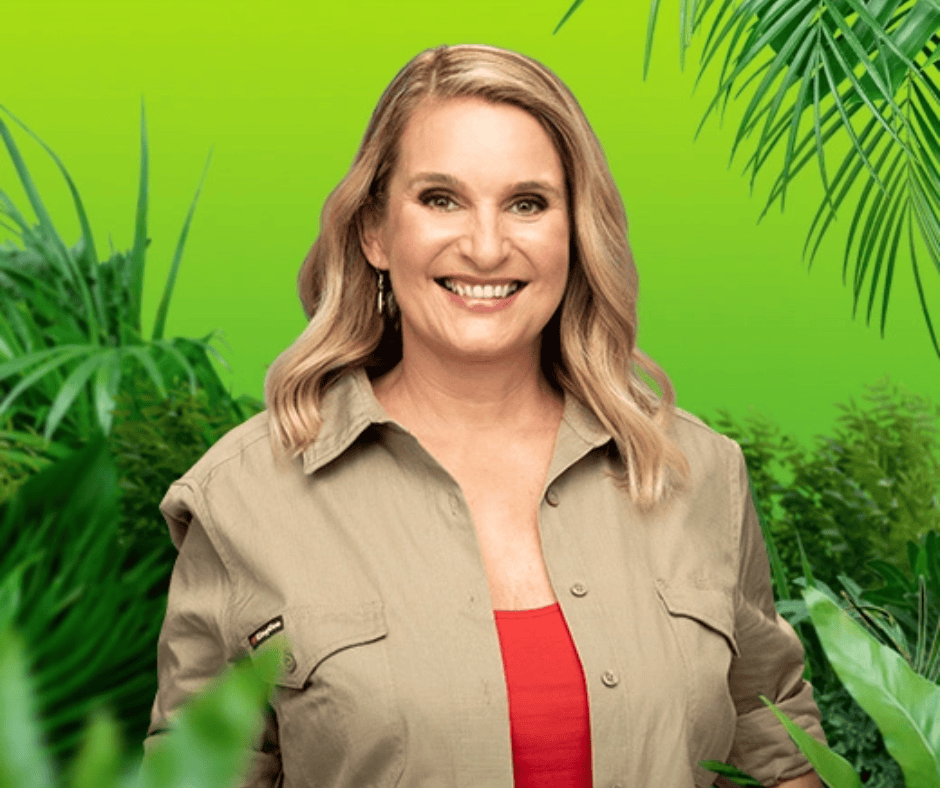 Image Description 1: Reggie, wearing a red singlet and khaki shirt, smiles while standing in front of a green background with plants framing her.