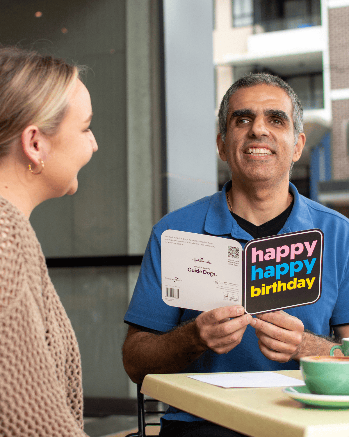 Guide Dog Client, Andrew recieving an accssible card.