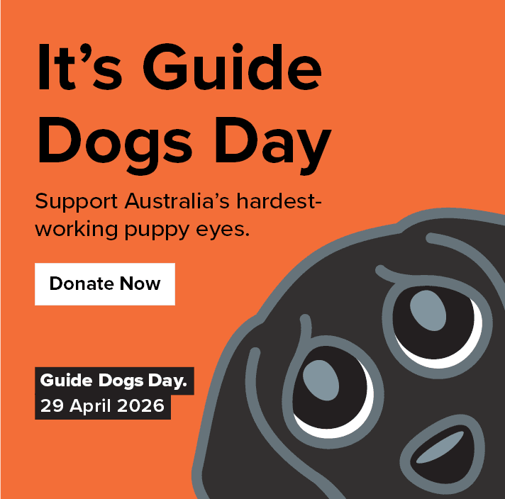 A graphic image reading “It’s Guide Dogs Day. Support Australia’s hardest-working puppy eyes. Donate Now. Guide Dogs Day 29 April 2026”. To the right of the text is a black cartoon labrador puppy with big eyes on a bright orange background.